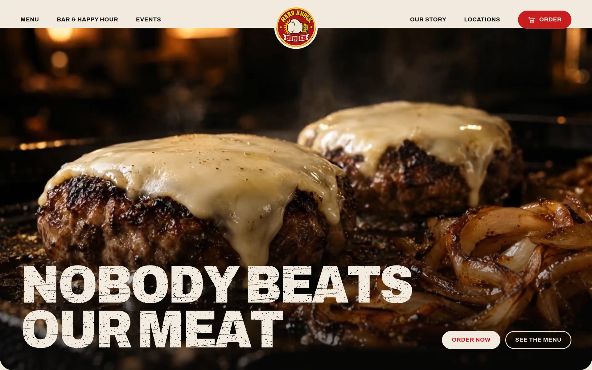 The Hard Knock Burger home page: NOBODY BEATS OUR MEAT over two cheese-topped patties and caramelised onions