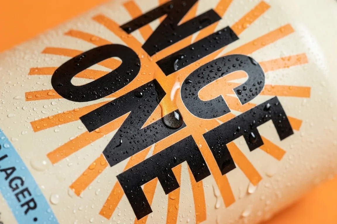 Macro of the cold Nice One can, condensation rolling down the wordmark